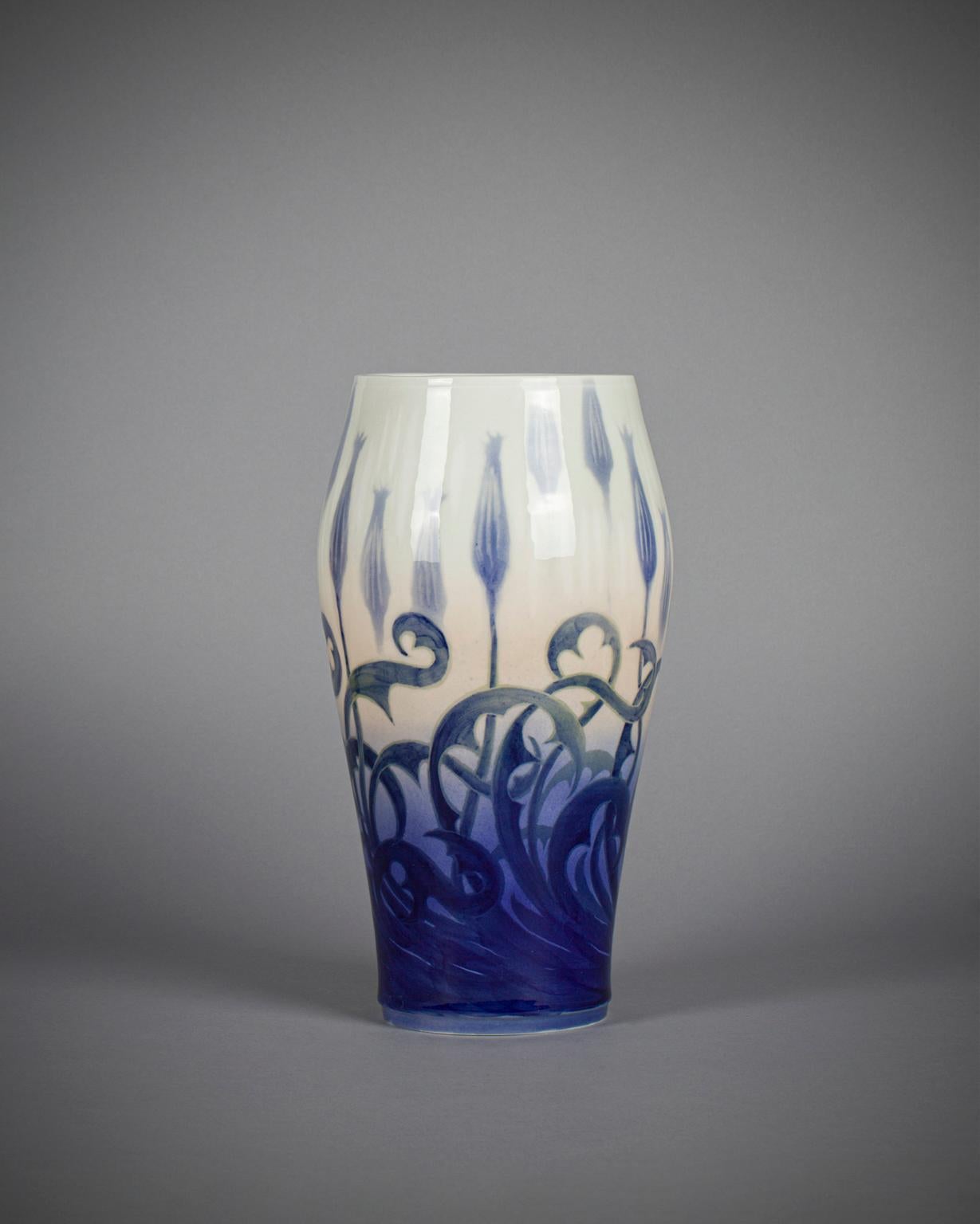 Signed Gerhard Heilmann (1859-1946) tall porcelain vase with exotic floral decoration. Copenhagen, Denmark, painted factory marks and artist's name in blue.