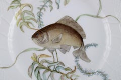 Royal Copenhagen porcelain lunch plate with hand-painted fish motif
