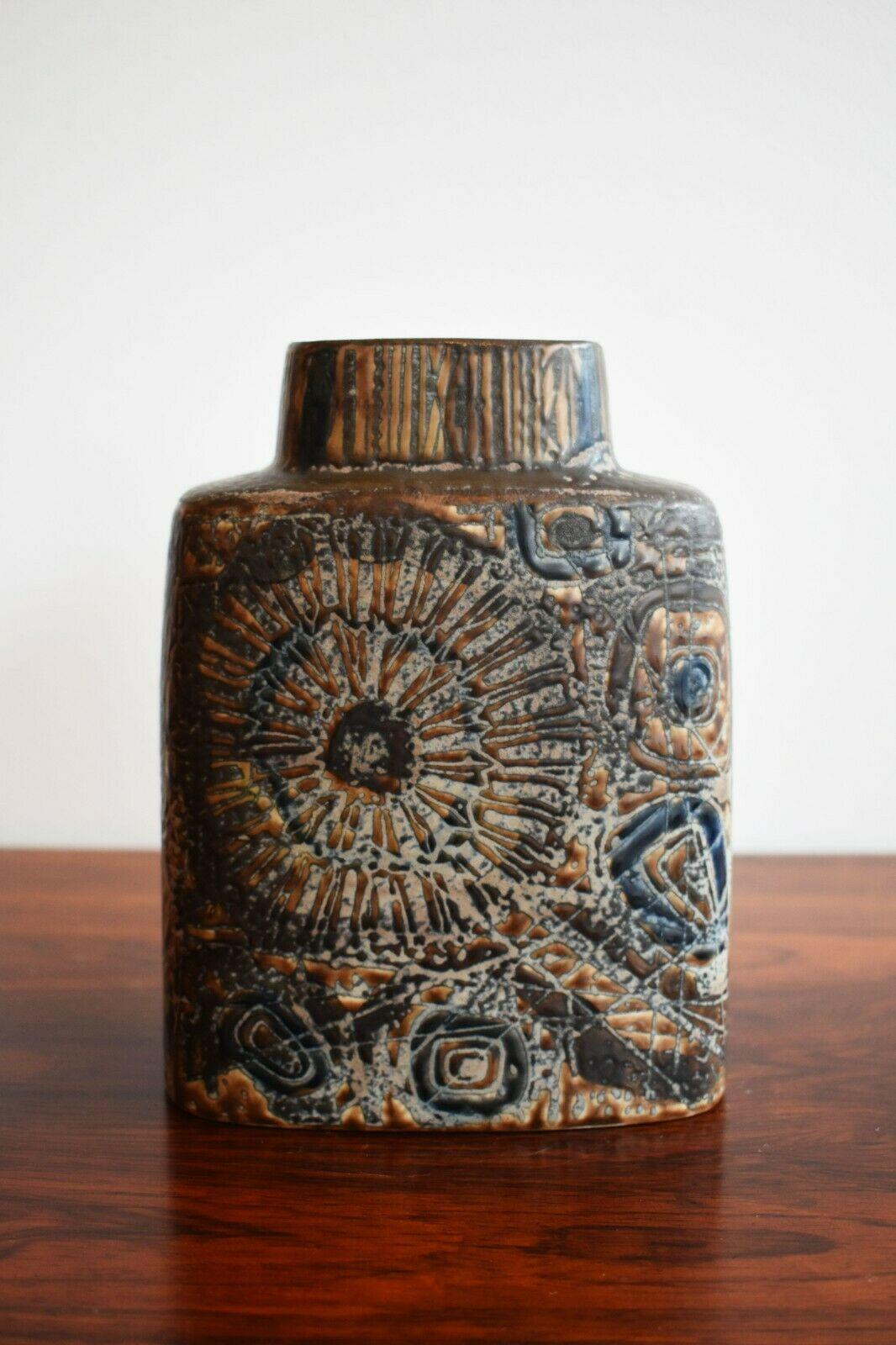 Copenhagen Pottery ceramic vase with beautiful and intricate textural detailing. 

The pot boasts a range of earthy tones, which are accentuated by the grooves and textures within the pot itself.