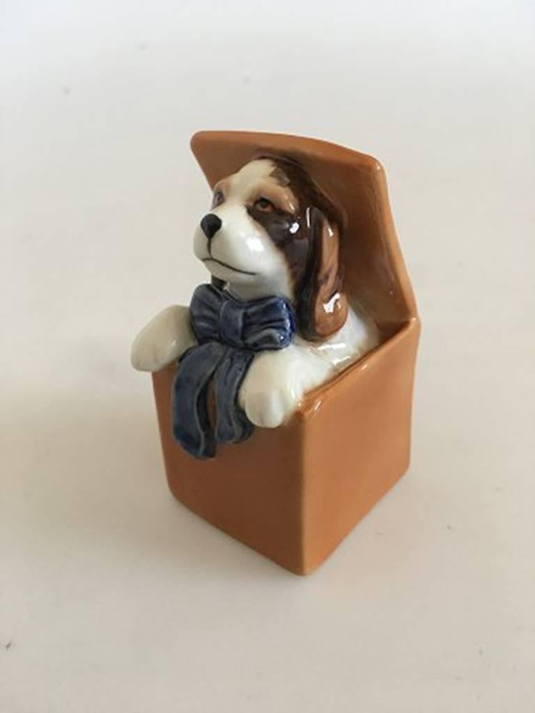 Royal Copenhagen Puppy collection cocker spaniel figurine #751. Created by Allan Therkelsen. Measures: 8 cm H (3 5/32in). In perfect condition and in original box.
