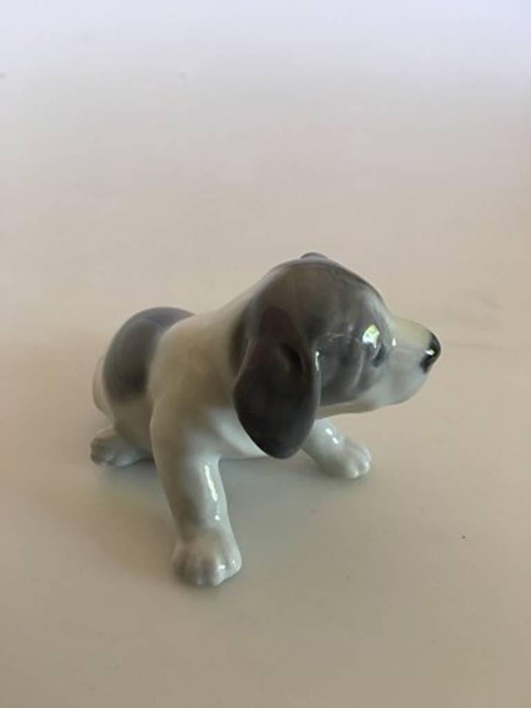 Royal Copenhagen puppy figurine no. 1311. Measure: 5 x 9 cm. 1st quality. In nice whole condition.