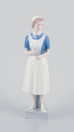 Royal Copenhagen, rare porcelain figurine of a nurse. Model: 4507/156.