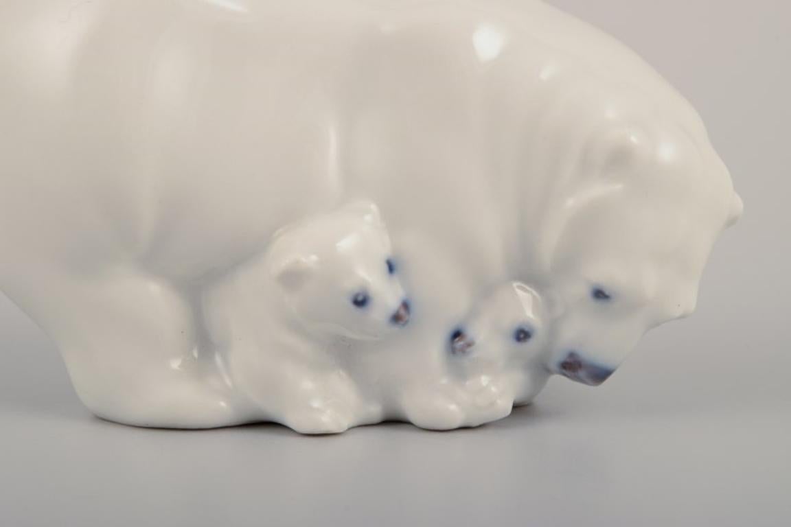 Royal Copenhagen, rare porcelain figurine of a polar bear mother with three cubs.
Model number 4780.
Designed by Jeanne Grut.
1960s
Stamped.
Perfect condition.
First factory quality.
Dimensions: L 7.5 cm x H 4.0 cm.