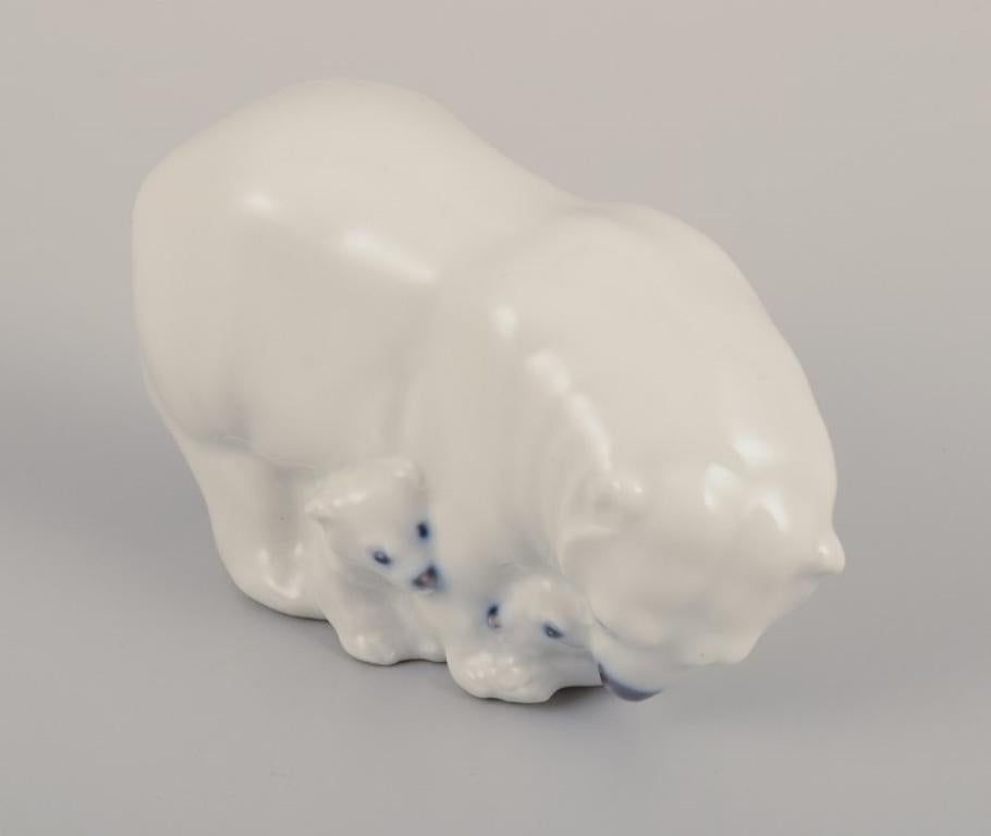 Danish Royal Copenhagen, rare porcelain figurine of a polar bear mother with three cubs