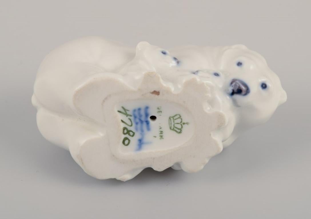 Porcelain Royal Copenhagen, rare porcelain figurine of a polar bear mother with three cubs