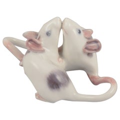 Royal Copenhagen, rare porcelain figurine of two mice. Approx. 1920