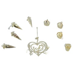 Royal Copenhagen "Royal Christmas". Nine brass Christmas ornaments.