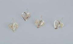 Royal Copenhagen "Royal Christmas". Set of eight brass Christmas ornaments.