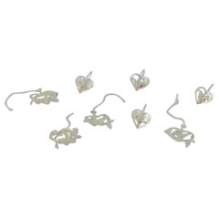 Royal Copenhagen "Royal Christmas". Set di otto ornamenti natalizi in ottone.