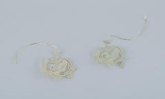 Royal Copenhagen "Royal Christmas". Set of ten brass Christmas ornaments.