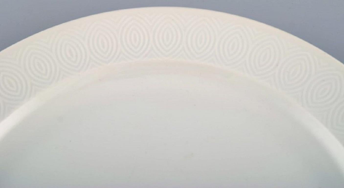Royal Copenhagen. Salto service, White. Large round serving dish. 1960s.
Diameter: 34.5 cm.
In excellent condition.
1st factory quality.
Designed by Axel Salto in 1956.