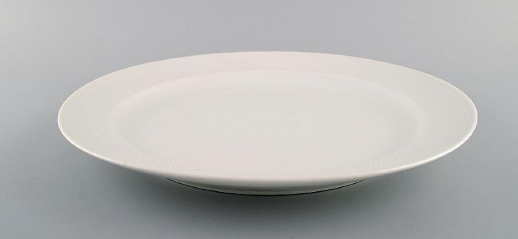 Royal Copenhagen. Salto service, white. Large round serving dish. Dated 1962
Diameter: 34.5 cm.
In excellent condition.
1st factory quality.
Designed by Axel Salto in 1956.