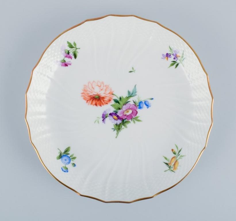Hand-Painted Royal Copenhagen, Saxon Flower, a plate and a low bowl with flowers For Sale