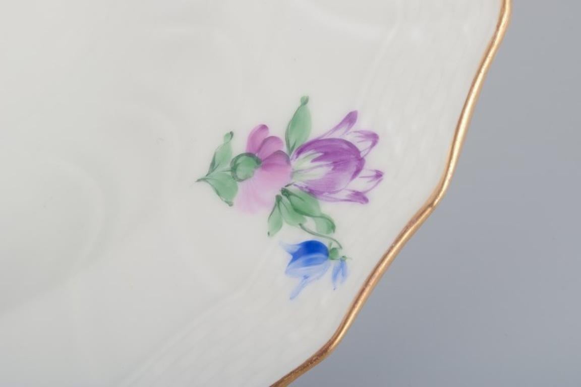 20th Century Royal Copenhagen Saxon Flower. Four deep plates in porcelain. Early 20th C. For Sale