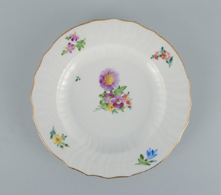 Hand-Painted Royal Copenhagen Saxon Flower. Four Dinner Plates in HandPainted Porcelain For Sale