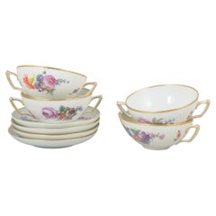 Royal Copenhagen Saxon flower. Set of four porcelain bouillon cups & saucers.