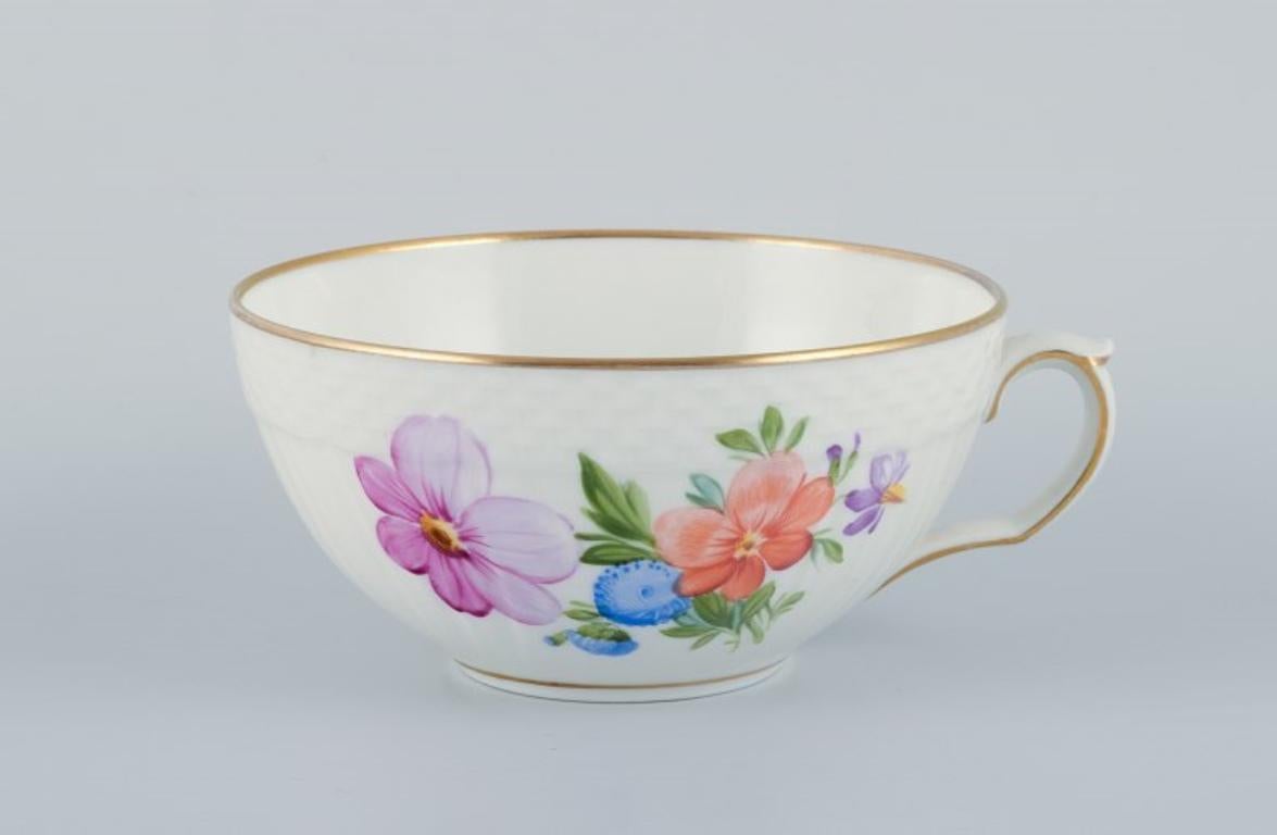 Mid-20th Century Royal Copenhagen, Saxon Flower, set of four tea cups with saucers in porcelain. For Sale