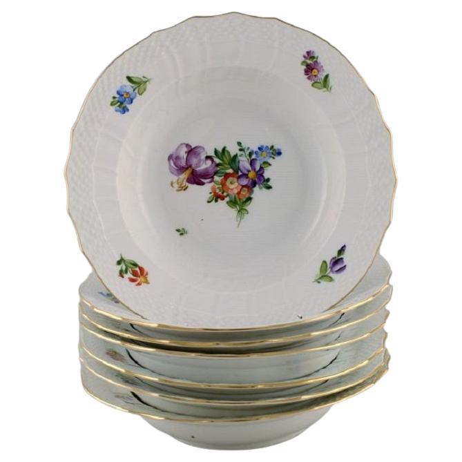 Royal Copenhagen Saxon Flower, Seven Deep Plates in Hand-Painted Porcelain