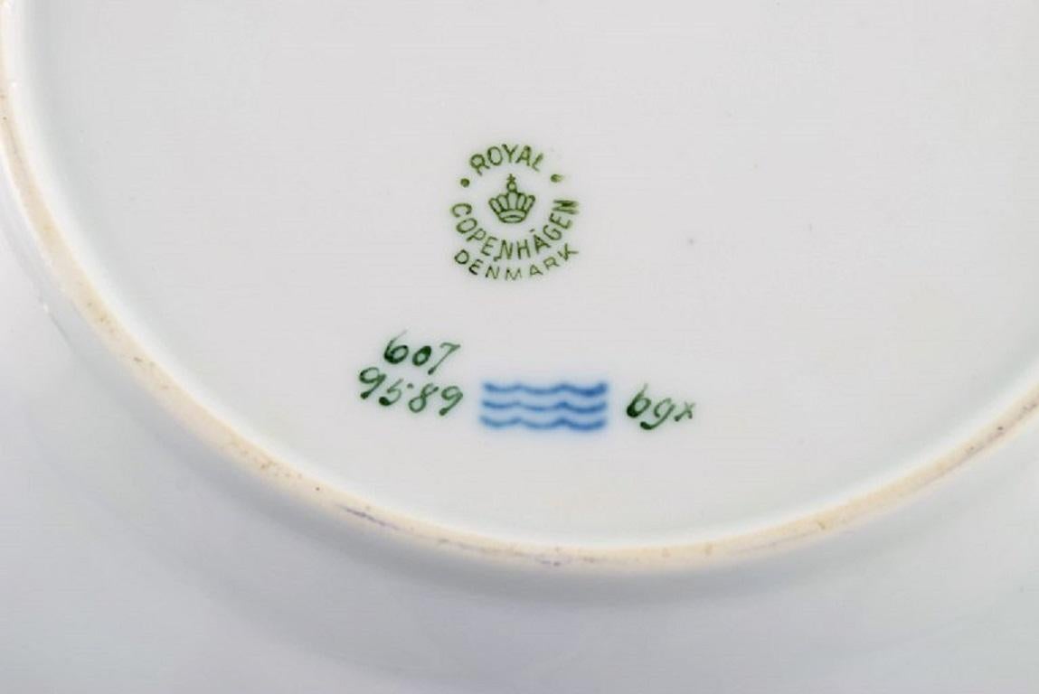 Royal Copenhagen Service No. 607. Nine Porcelain Lunch Plates, Dated 1946 For Sale 1