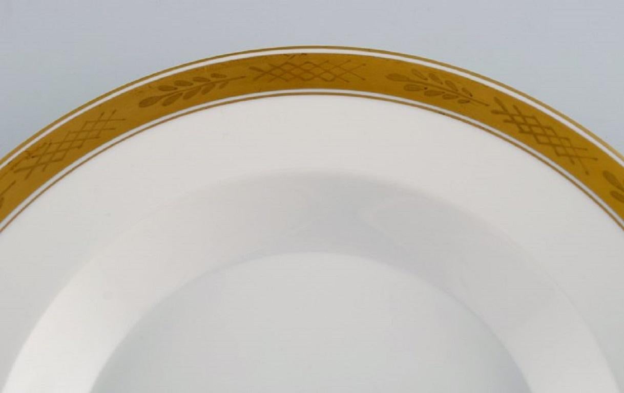 Mid-20th Century Royal Copenhagen Service No. 607, Twelve Deep Porcelain Plates