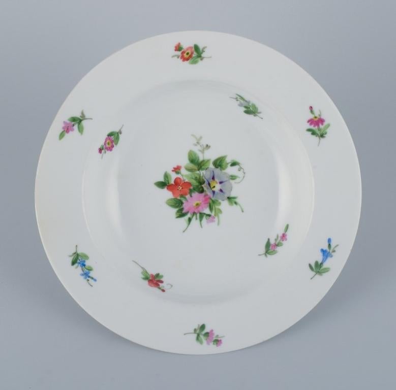 Hand-Painted Royal Copenhagen, set of four rare and antique Saxon Flower porcelain plates. For Sale