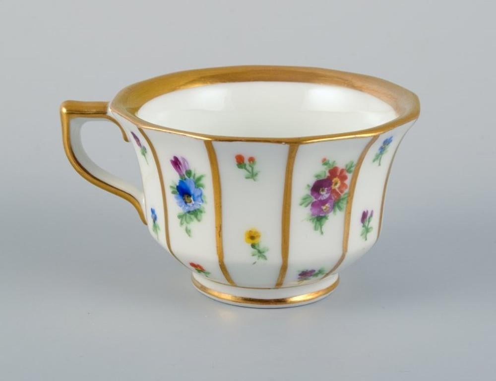 Porcelain Royal Copenhagen, six Henriette mocha cups and saucers hand-painted with flowers