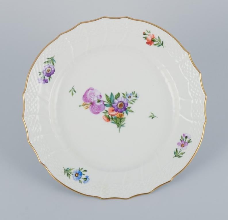 Royal Copenhagen, set of six Saxon Flowers lunch plates in porcelain.
Hand-painted with various polychrome floral motifs.
Model number 493/1623.
Approximately 1960.
Marked.
First factory quality.
In excellent condition.
Provenance: Hotel