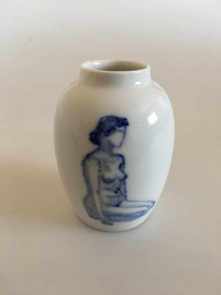 Royal Copenhagen small unique vase with motifs of nude sitting women. Measure: 9 cm H (3 35/64 inches) in perfect condition.