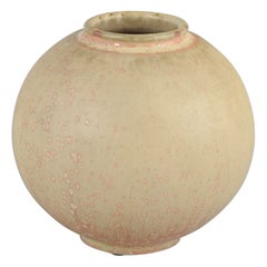 Royal Copenhagen. Spherical stoneware vase in pink, white, and beige tones.