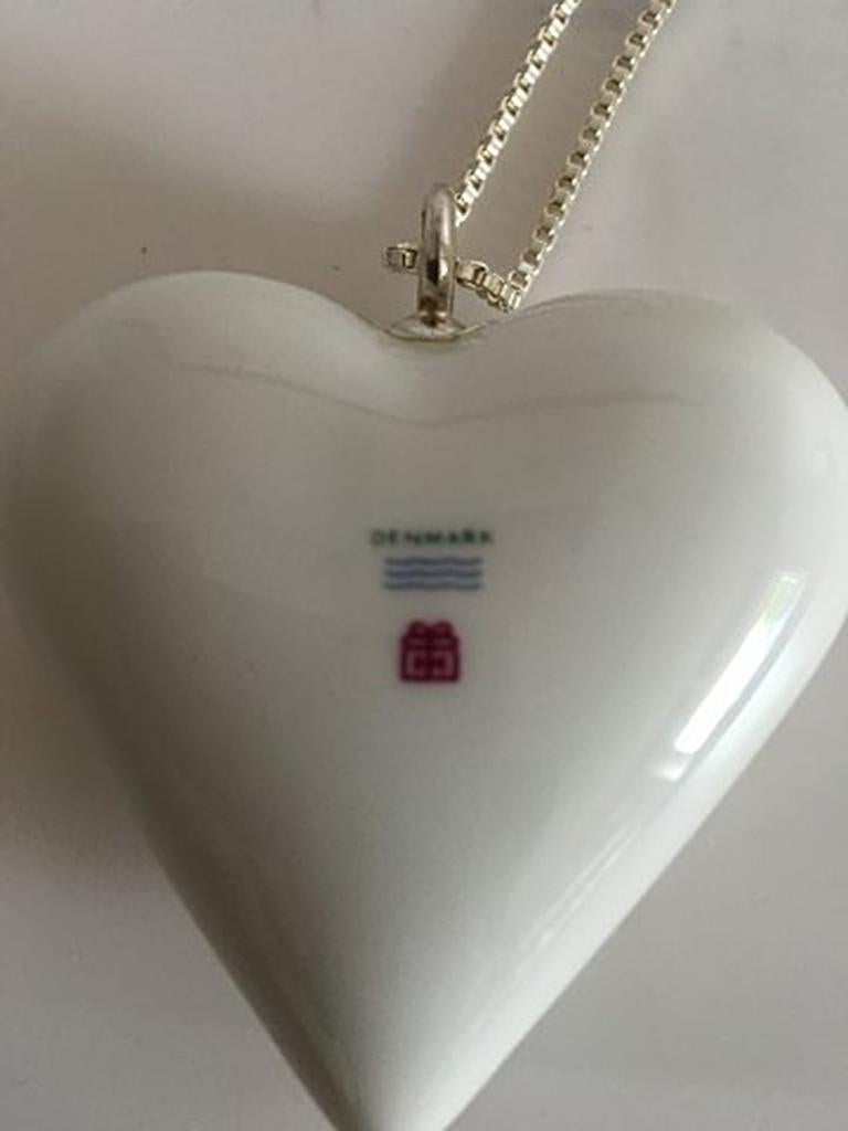 Royal Copenhagen Sterling Silver Necklace with White Porcelain Heart Pendant. Chain measures 60 cm (23 5/8 in). The Heart measures 6 x 6 cm (2 23/64 x 2 23/64 in)
