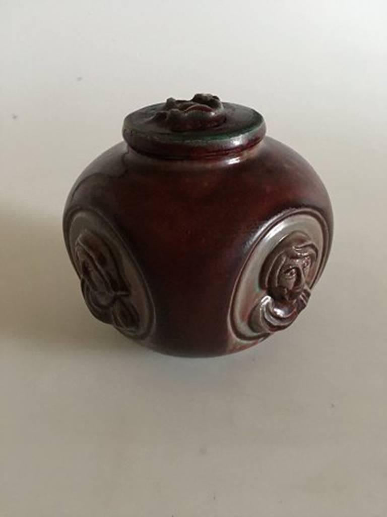 Royal Copenhagen stoneware vase in oxblood glaze by Jais Nielsen 97/2798. Measures 10.5 cm and is in good condition.