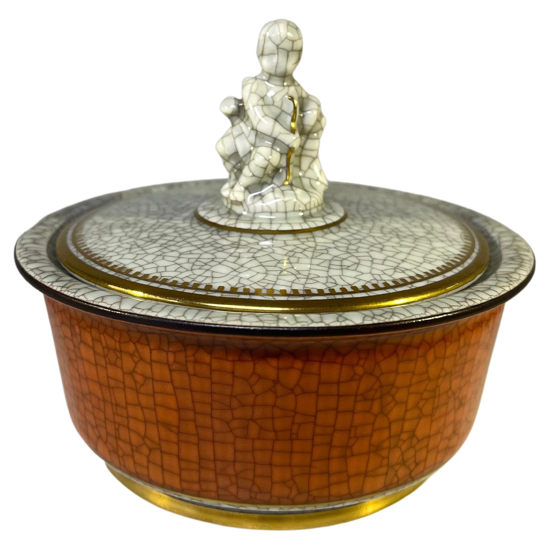 Royal Copenhagen Terracotta and Gilt Craquelure Cupid Figural Lidded Pot #2936 For Sale