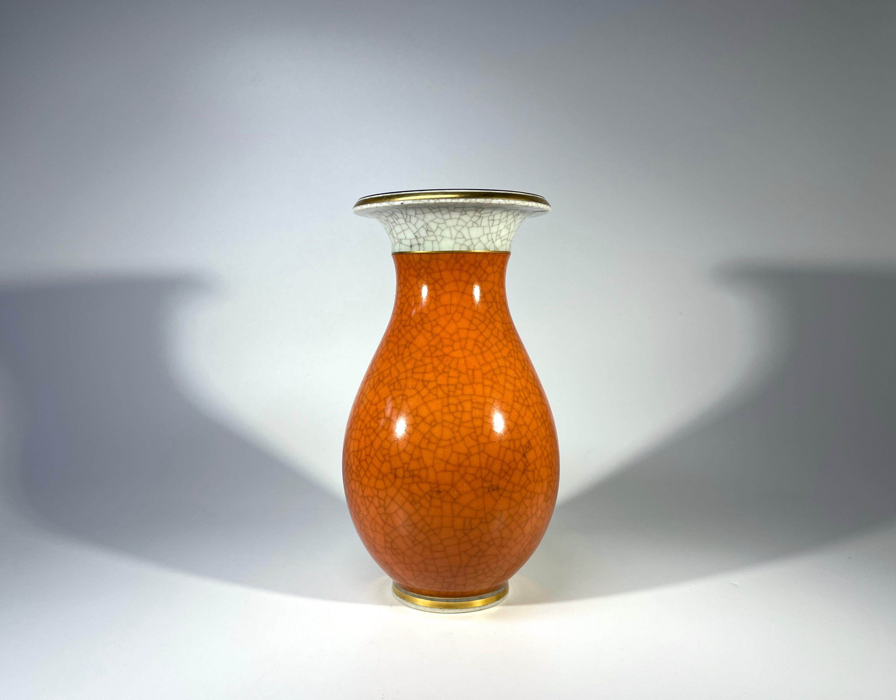 Graceful and petite, Royal Copenhagen porcelain terracotta and grey crackle glazed vase with gilded banding 
A discerning collectors piece
Circa 1960 to 1969
Stamped and numbered 2526
Height 6 inch, Diameter 3.25 inch
Very good condition. 
Wear