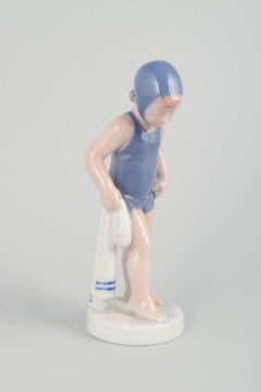 Royal Copenhagen. "The Swimmer” porcelain figurine of girl in blue swimsuit.