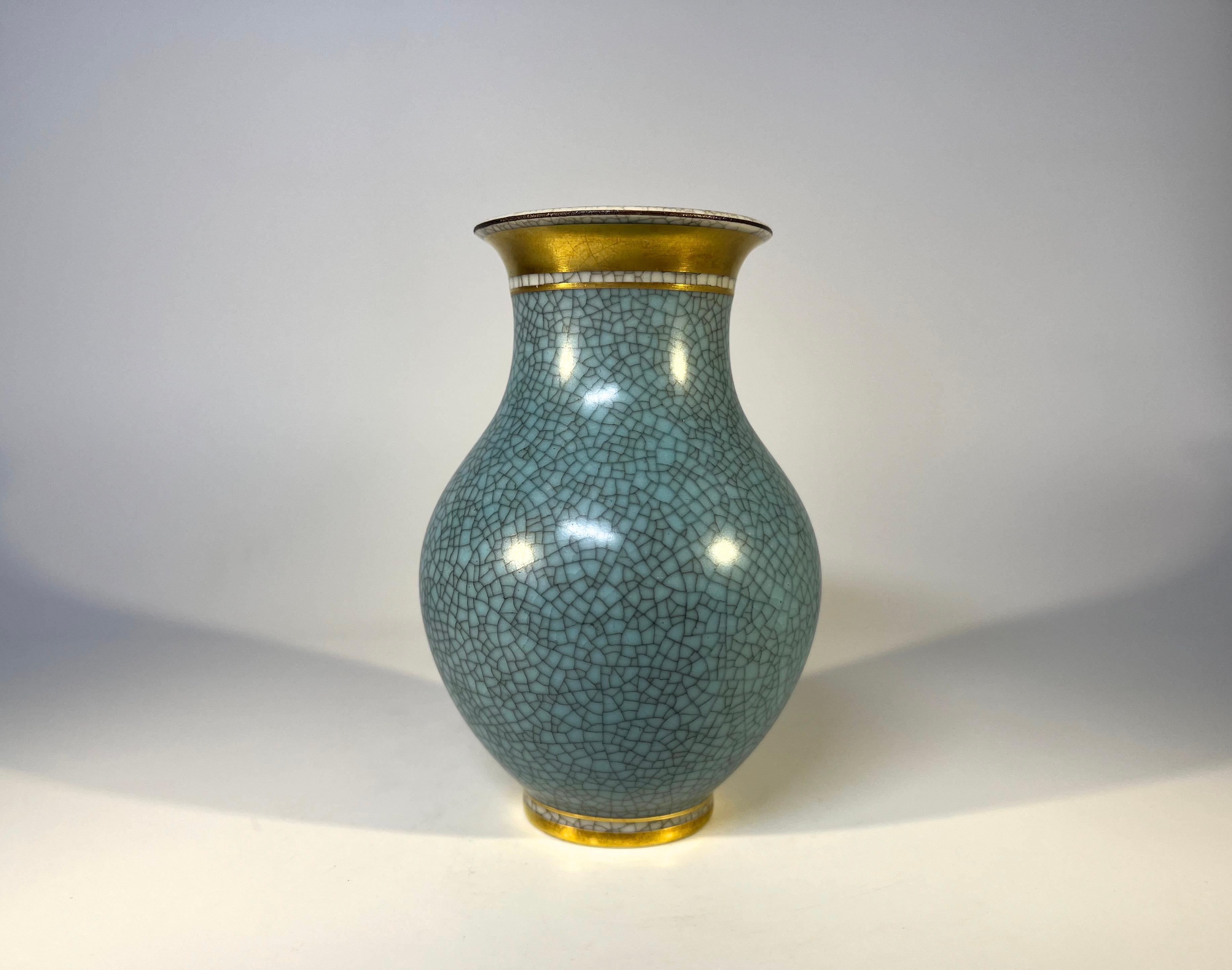 Royal Copenhagen porcelain gilded turquoise and grey crackle glazed petit baluster vase 
A diminutive, quality vase from Royal Copenhagen
Circa 1960's
Stamped and numbered 2736
Height 4.5 inch, Diameter 3 inch
Very good condition. 
Wear consistent