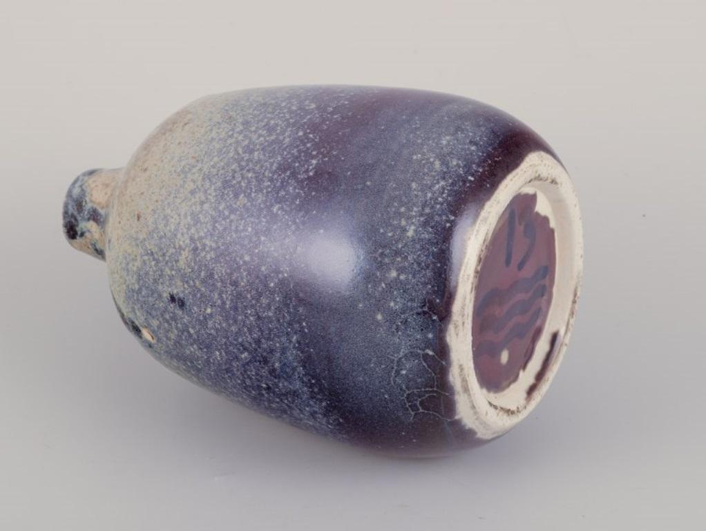Ceramica Royal Copenhagen. Vaso in ceramica unico nel suo genere.  Smalto Test nei toni del viola. in vendita