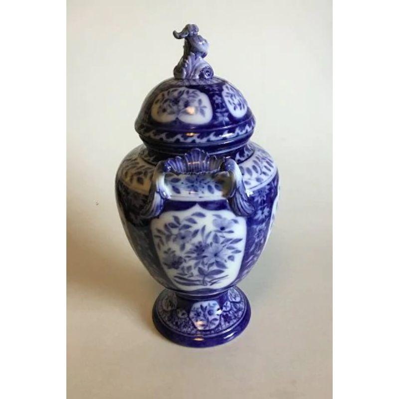 Royal Copenhagen Unique Potpourri jar with flower decoration in blue by Anna Smith

Measures 42 cm / 16 17/32 in. Decorated by Anna Smidth, 1886.