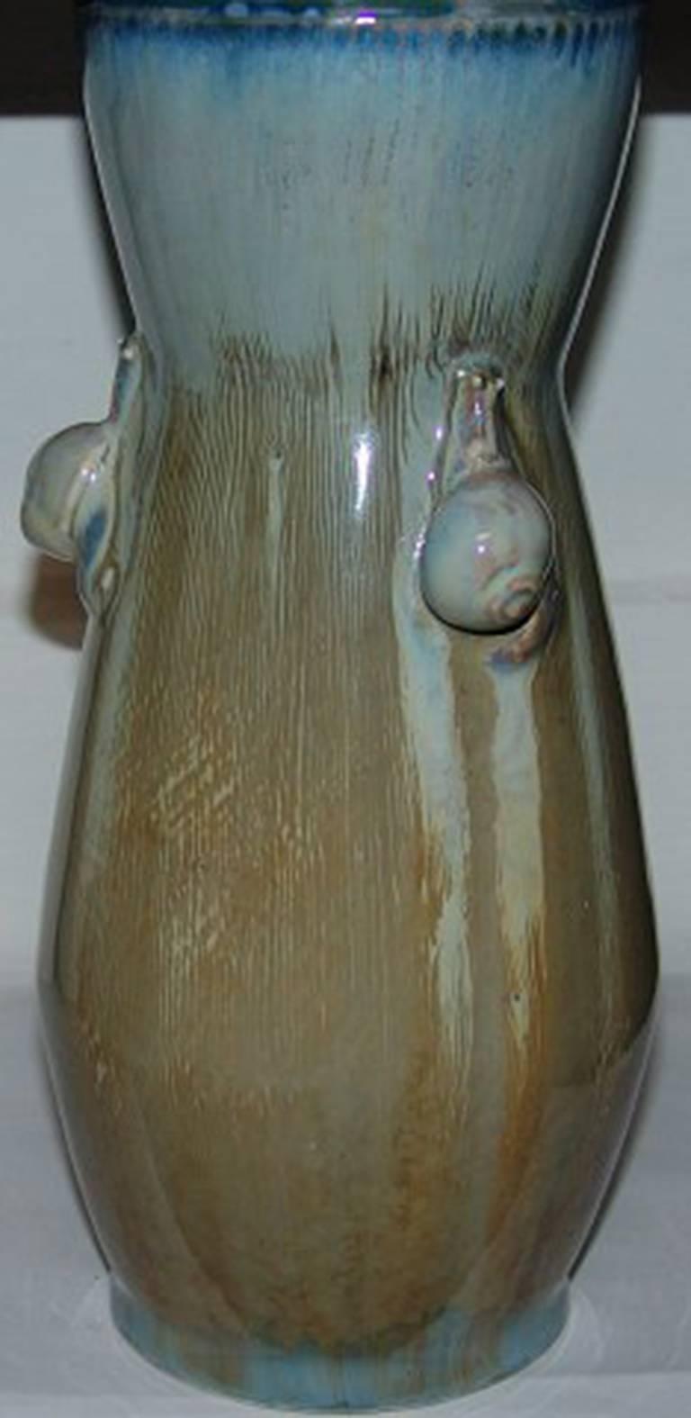Royal Copenhagen unique vase by Anna Smith and Valdemar Engelhardt from 1892. Measures 25 cm and has been repaired. We will be interested in buying similar vases with same running or crystalline glaze.