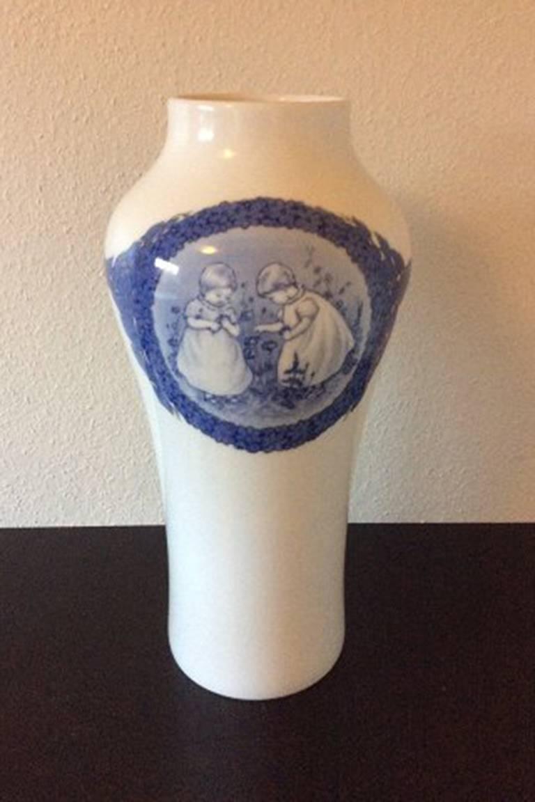 Royal Copenhagen unique vase by Cathrine Zernichow from 1917 with motif of children.

Measures 53cm/ 20 7/8 inches high

In perfect condition.