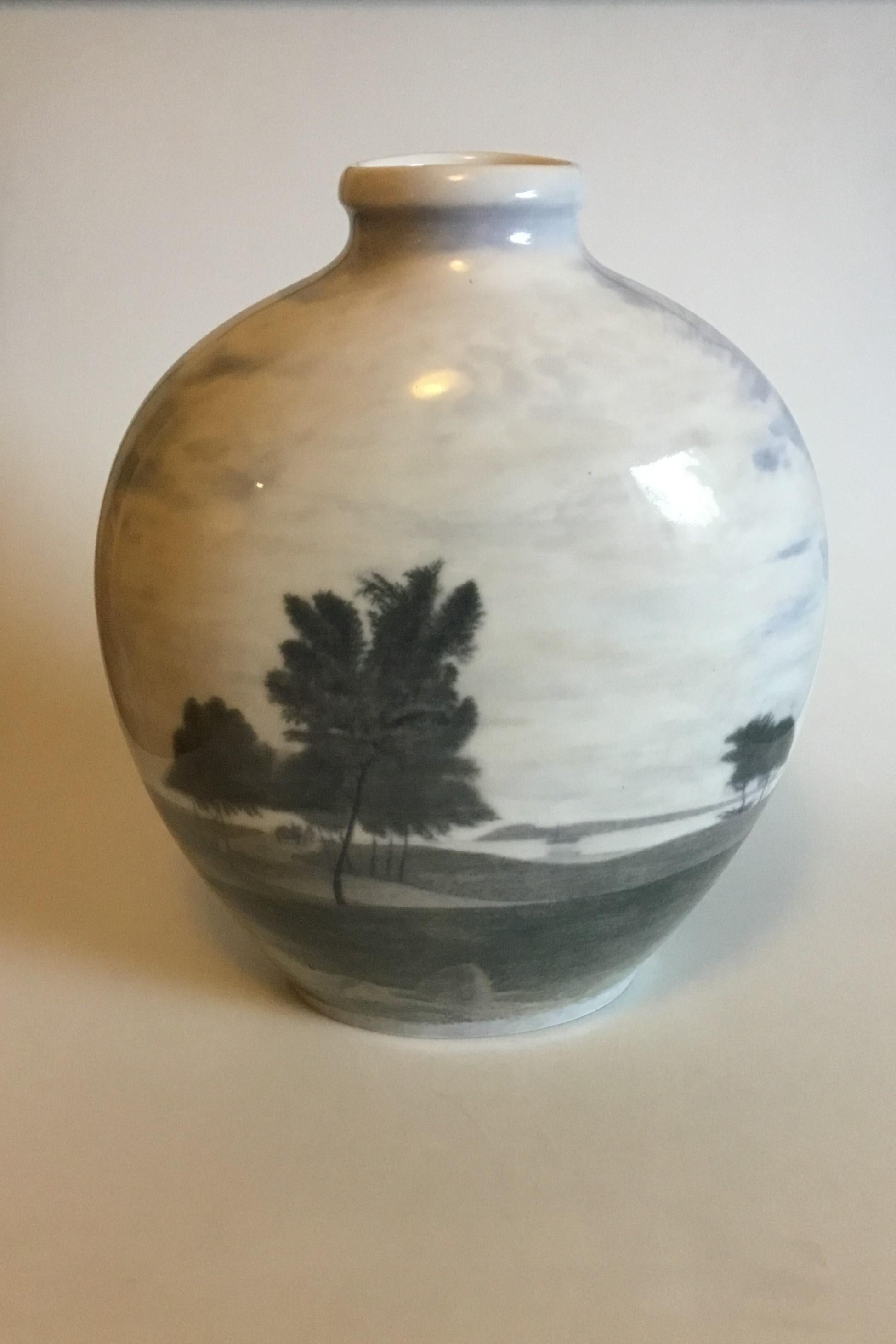 Royal Copenhagen Unique Vase by Karl Sørensen from November 14th 1923 with motif of Windmill and Landscape. 

Measures 39 cm / 15 23/64 in. 

Is in good condition.