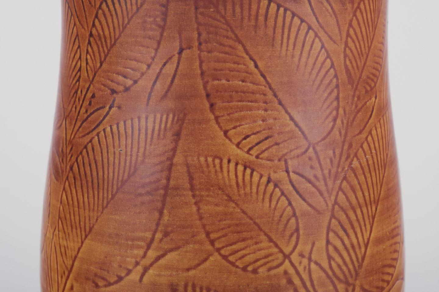 Glazed Royal Copenhagen, vase in burnt red clay, decorated with foliage. For Sale