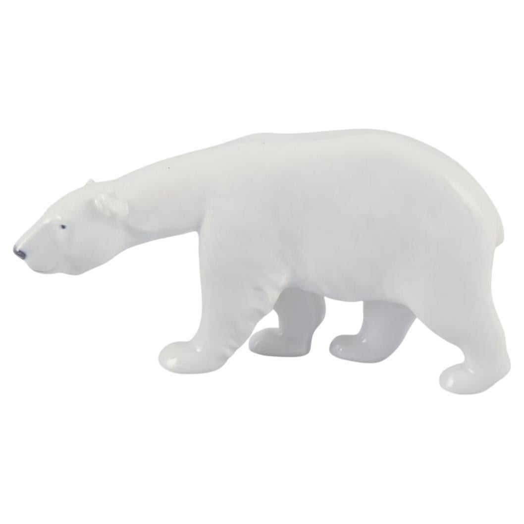 Royal Copenhagen, walking polar bear figurine in porcelain. Approx. 1930