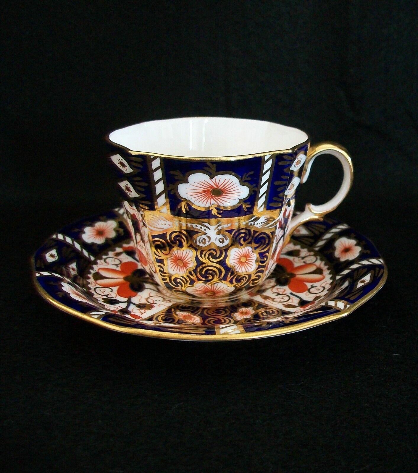 ROYAL CROWN DERBY - Imari Pattern Number 2451 - Vintage bone china tea cup with fluted sides (replacement - circa 1950's) and an antique saucer (circa 1913) - elaborate gilt decoration over blue and orange hand painted oriental pattern - each signed
