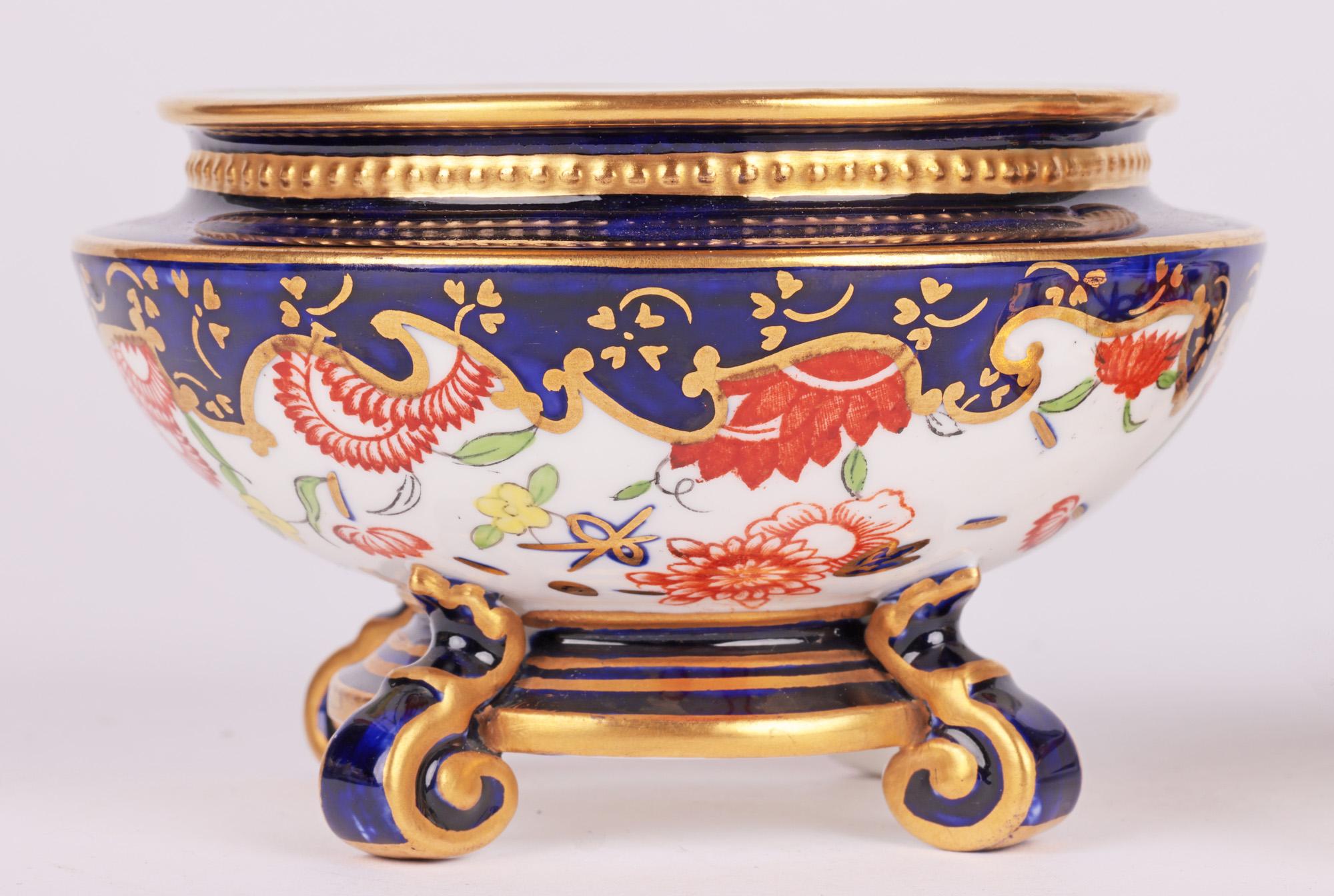 Royal crown derby imari pattern porcelain lidded trinket pot
A stunning early art deco royal crown derby imari pattern porcelain lidded trinket pot dating from 1915. This finely made pot stands raised on four scroll feet supporting a narrow round