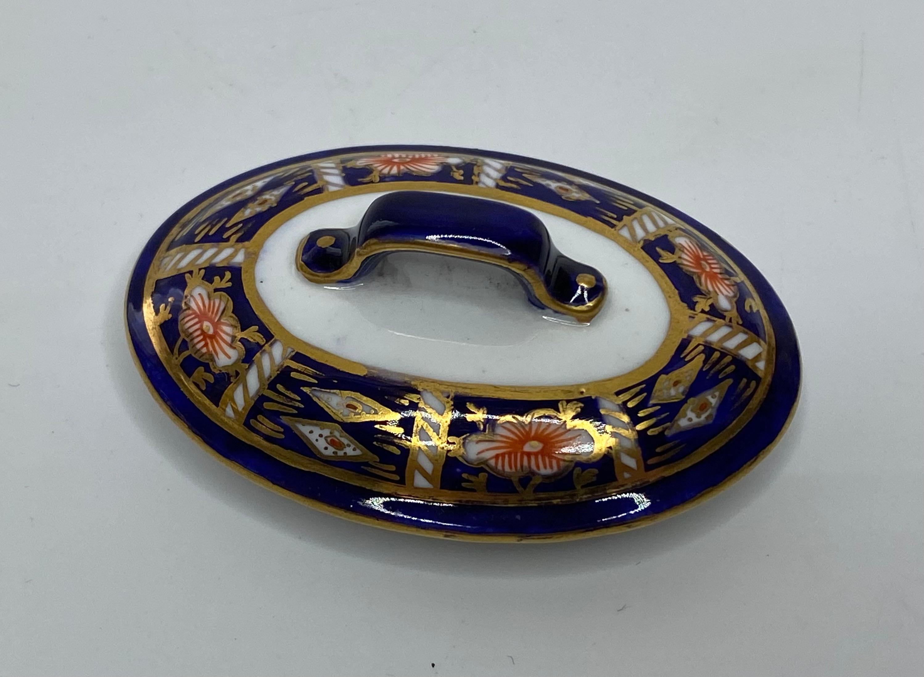 Early 20th Century Royal Crown Derby miniature fish kettle, d. 1922.