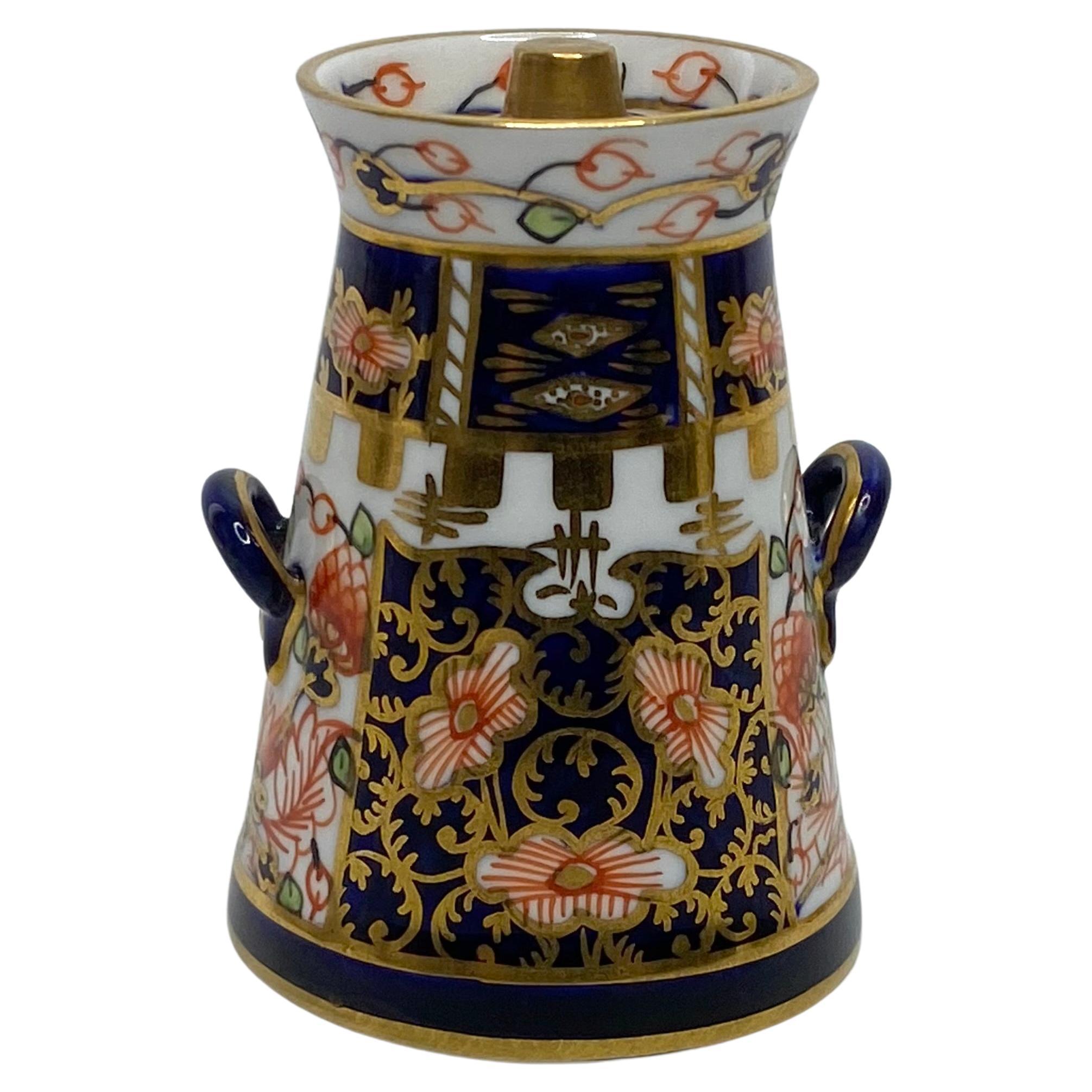 Royal Crown Derby miniature milk churn and cover, dated 1921.