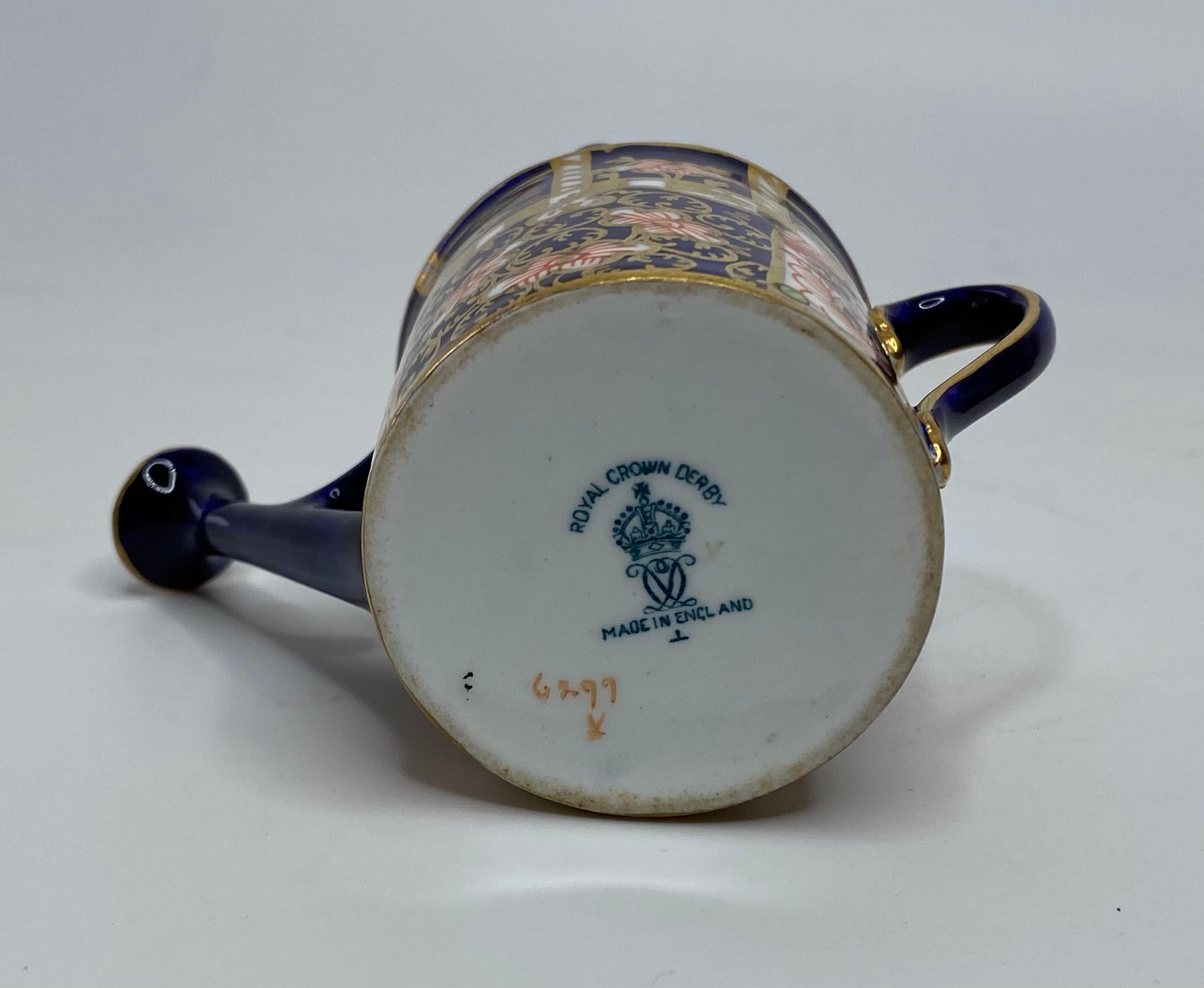 Early 20th Century Royal Crown Derby miniature watering can, d. 1922.