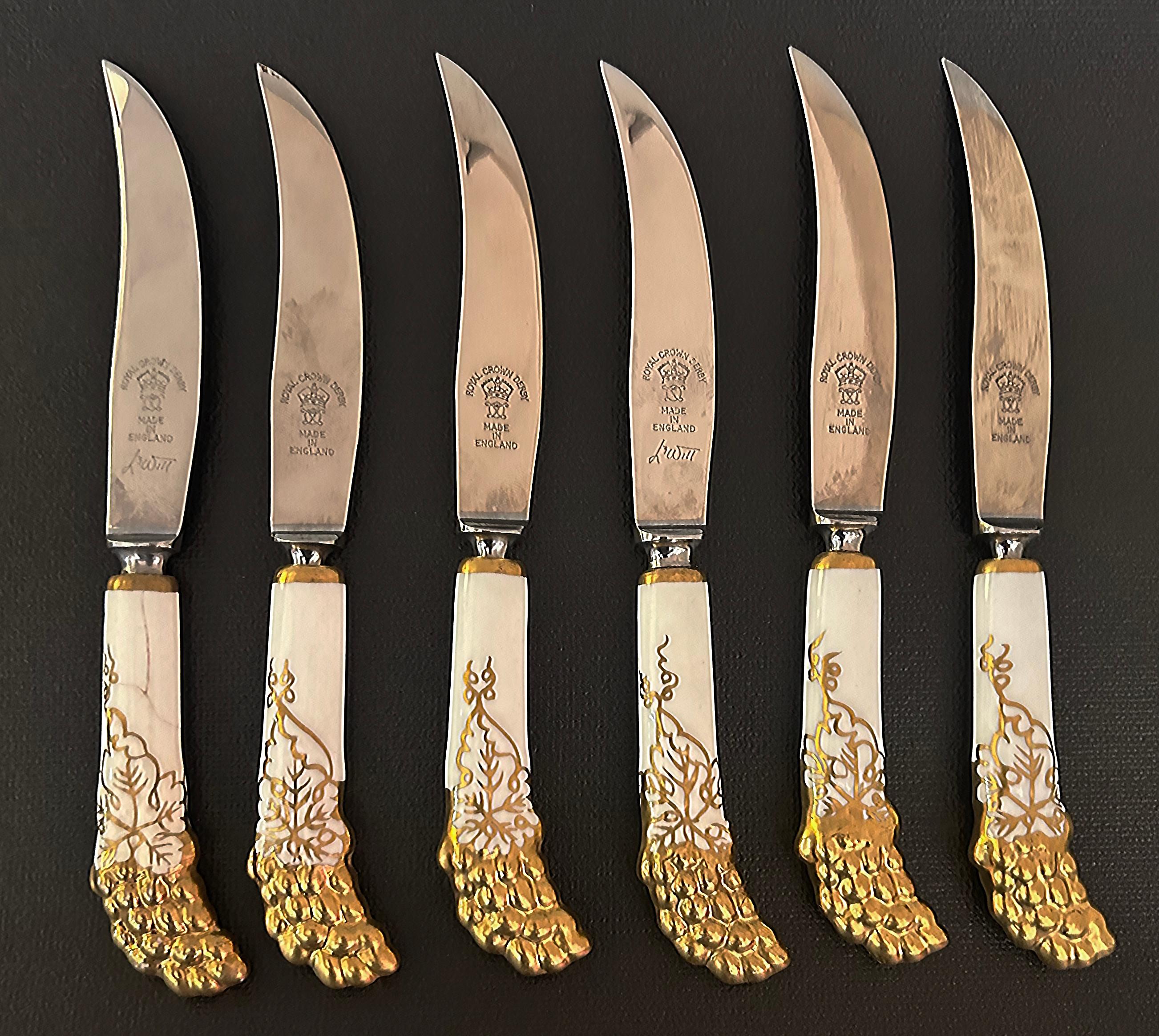 Royal Crown Derby Porcelain, Stainless Fruit Knives Set, Leather Box

Offered for sale is a set of six Royal Crown Derby gilt porcelain and stainless steel fruit knives in their original fitted tooled leather box. Made in England, this lovely set of