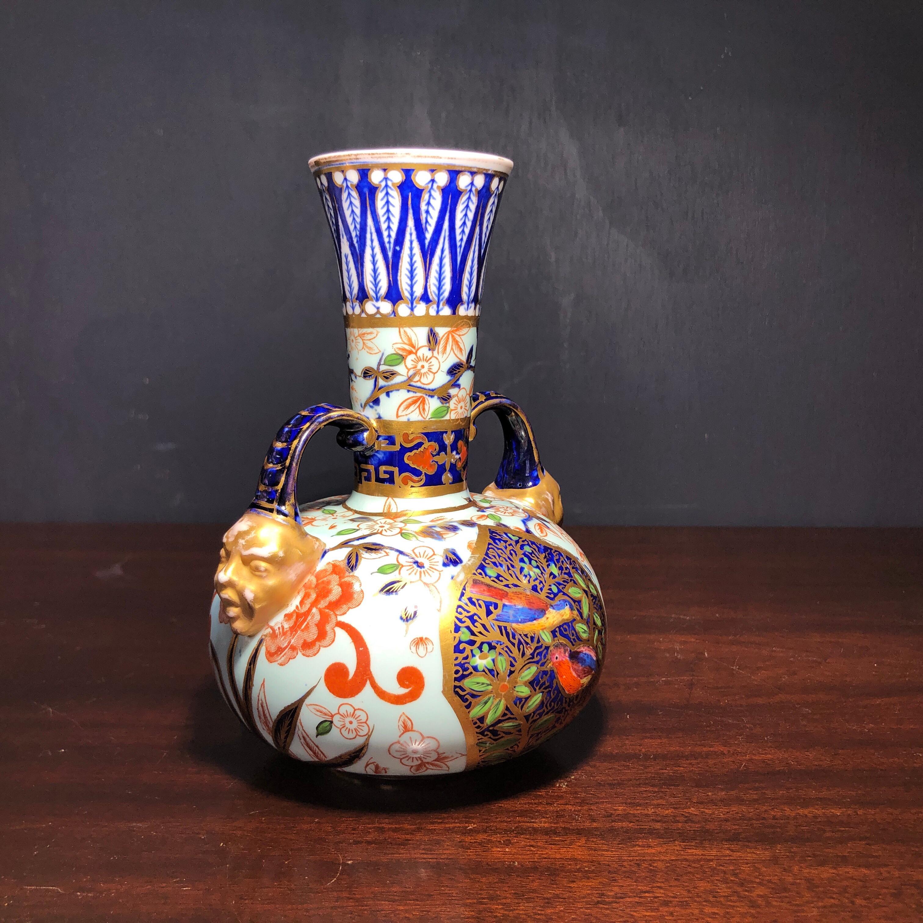 Porcelain Royal Crown Derby Vase, Oriental Decoration and Face Handles, circa 1885