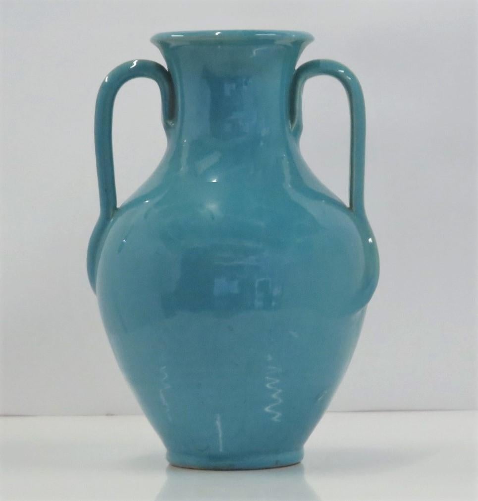 REDUCED FROM $450....A large Turquoise Blue Rat Tail Handled Urn from the Merry Oaks, NC kilns of Royal Crown Pottery, realized between 1939 and 1942.  Retains the non-permanent ink stamp on the bottom reading Royal Crown   Hand Made Pottery. 